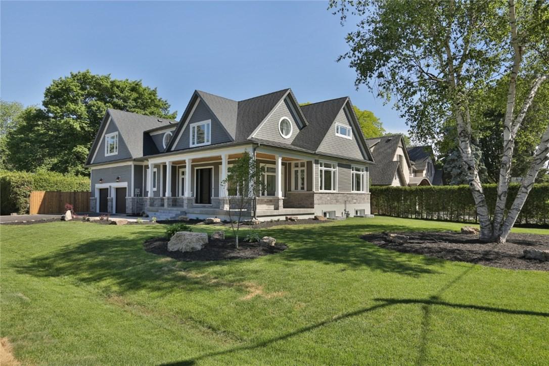 Traditional family home with a wraparound porch on a generous lot